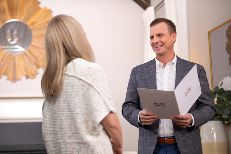 Mark Spain leading a showing to provide a guaranteed offer