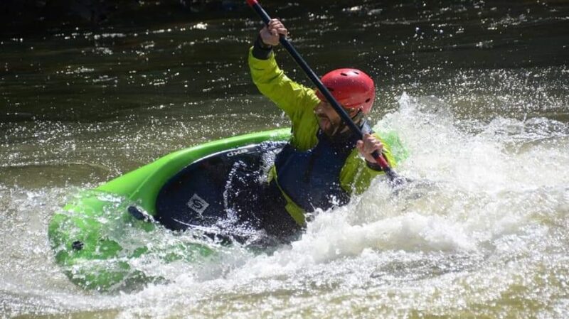 Brian kayaking in the water