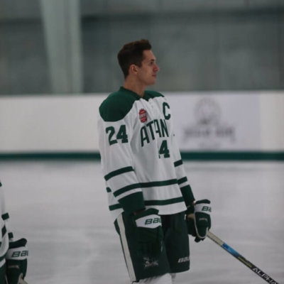 Hunter enjoys playing hockey with his friends